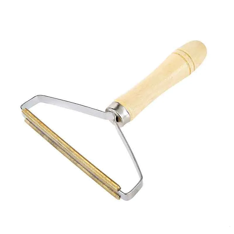 Brosse "Stop poils" ( 1 achetée = 1 offerte )