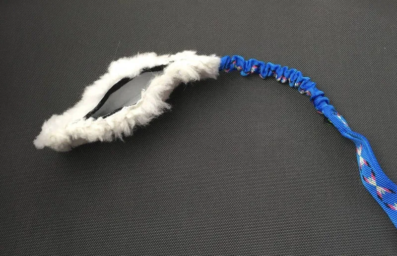 JOUET POCHETTE A FOURRURE MERINO